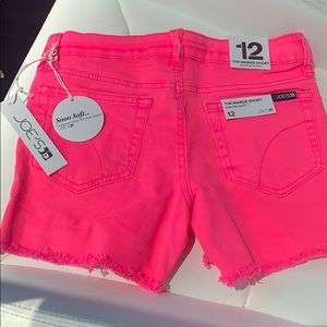 Bright pink Joe’s Markie Mid-Rise Shorts.